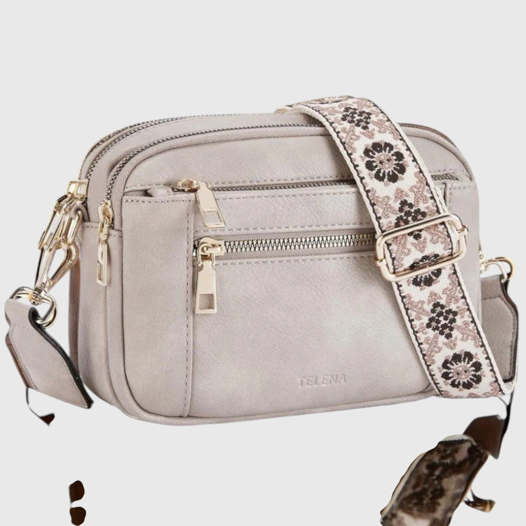 Sharena™ – Skuldertaske med blomstret rem